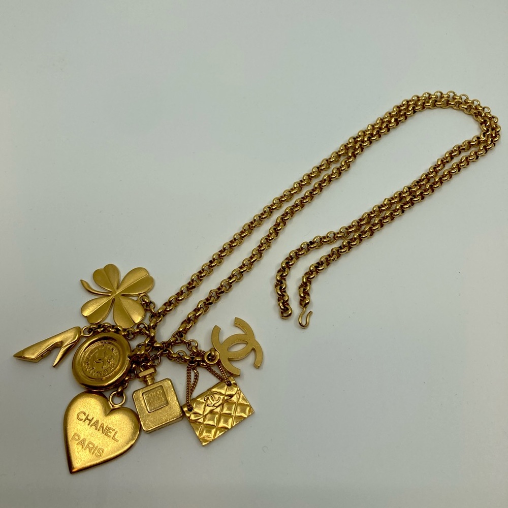 SOLD Vintage Chanel multi charm belt and necklace